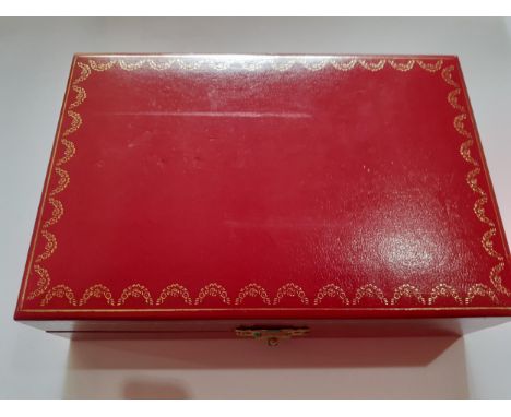 A small red Cartier jewellery box 