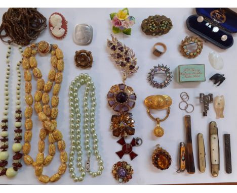 A small quantity of costume jewellery, cheroots, and fruit knives to include yellow metal sleeper earrings, mother of pearl i