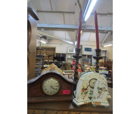 An Edwardian Kendal & Dent mahogany mantel clock and later ceramic cased clocks together with a pair of oak barley twist cand