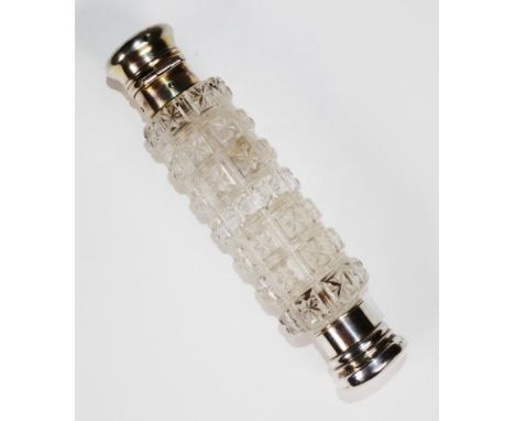Vintage double ended crystal perfume bottle with silvered caps to each end, and cut crystal body, (length 14cm approx).