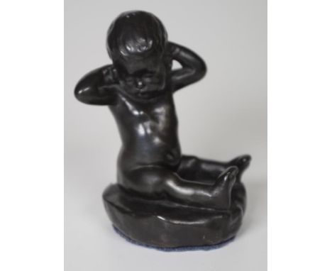 Vintage bronzed seated infant figure (height 10cm approx, total).