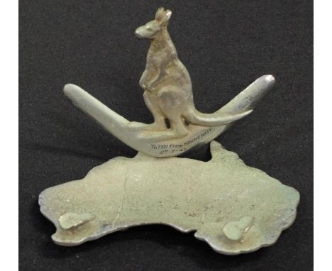Vintage Australian cast metal figural ashtray depicting a kangaroo sitting on a boomerang and a map of Australia, width 15cm 