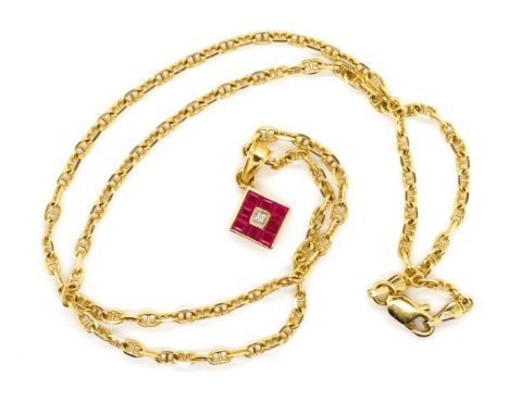 Ruby and diamond set 18ct gold pendant and chain both marked 750. The yellow gold anchor chain approx weight is 6.6 grams, 40