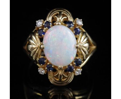 Opal, sapphire and diamond set 14ct gold ring marked 14k. Approx white opal cabochon size 11mm x 9mm, total ring weight 7 gra