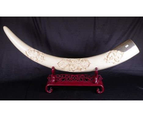 Vintage Chinese ivory carved tusk well carved ivory tusk, with a triptych of carved dragon scenes. With silver plated plaque 