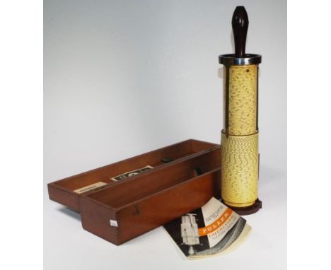 Vintage wood cased Fuller calculator in fitted wood case, with original Instruction manual. (Length 43cm approx).