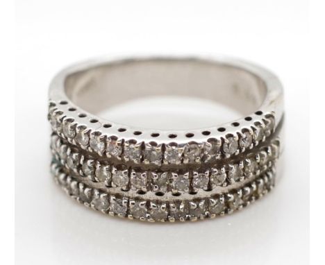 18ct white gold and diamond ring three rows of claw set diamonds marked 18kWG 0.32ct approx weight 4.2 grams, ring size F. Sm