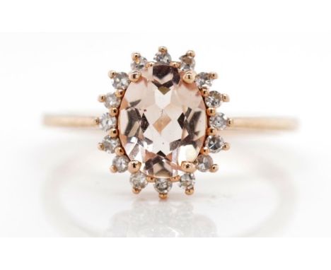 Morganite and diamond cluster rose gold ring marked 10k approx weight 1.95 grams, ring size N-O