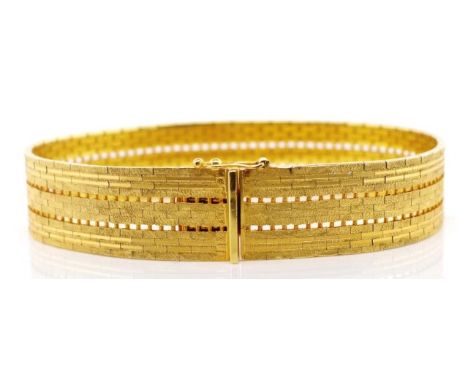Textured 9ct yellow gold bracelet satin and high polished links with open work. Box clasp and safety catch. Marked AmericG*k 