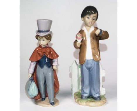 Two Lladro &amp; Nao standing figures including Lladro standing boy with suitecase, marked to base and # 6122, (height 23cm a