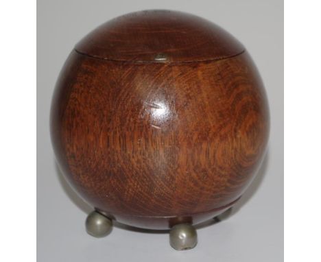 Vintage spherical wood tea caddy ball shaped container, on 4 metal ball feet, (height 14cm approx).