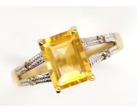 Citrine and diamond set 10ct yellow gold ring marked 10k. Approx citrine 6mm x 8mm rectangular cut.. Weight 1.7 grams, ring s