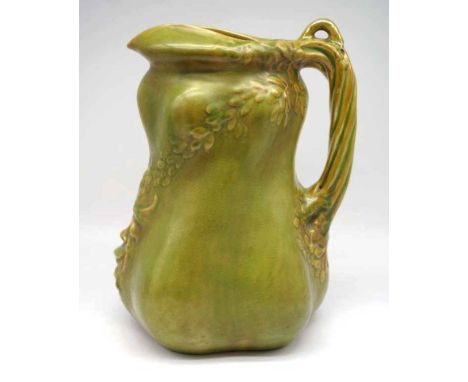 Vintage Swedish Gustafsberg ceramic jug bronzed glaze, with embossed Bacchus mask head and foliage decoration, signed 'Gustaf