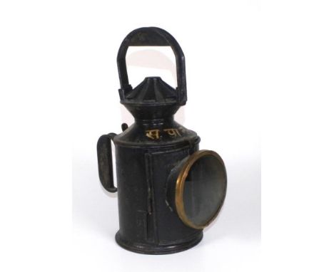 Early railway guards oil lamp with revolving coloured lenses, 33.5cm high approx.
