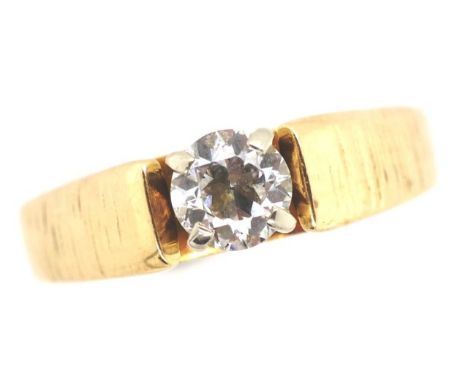 Diamond solitaire and yellow gold ring marked 14k approx 5.1mm diameter, total ring weight 4.2 grams, ring size M. Tests a 10