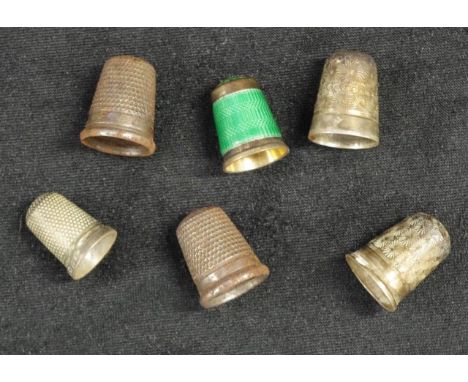 Six vintage thimbles including English silver &amp; enamel