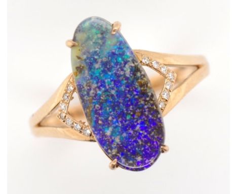 Boulder opal and diamond set rose gold ring marked G18k approx ring size N, weight 2.8 grams