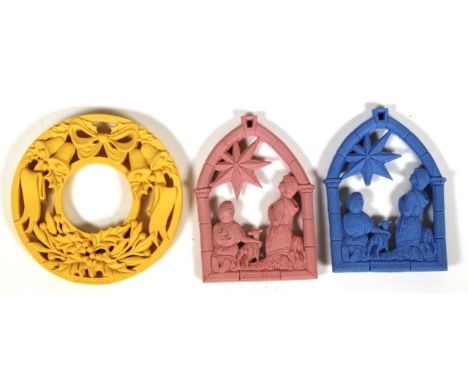 Three Wedgwood ceramic Christmas pendants including 2 various Nativity scenes, and a wreath form pendant.