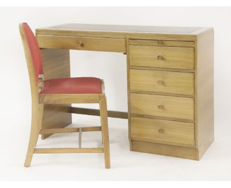 An Art Deco light walnut desk,with a leatherette top, five drawers and a slide,107cm wide47cm deep67cm high,together with a m