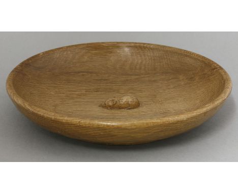 A 'Mouseman' oak bowl,the adzed bowl centred with a mouse,30cm diameter