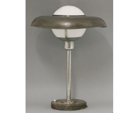 A chrome and copper desk lamp,with a globe shade and universal reflector,50cm high