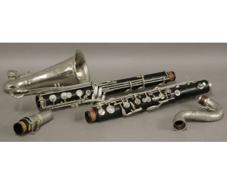 A Selmer (Paris) bass clarinet, the ebony body stamped X8913, in fitted transportation case, anda Boisson clarinet (2)Provena