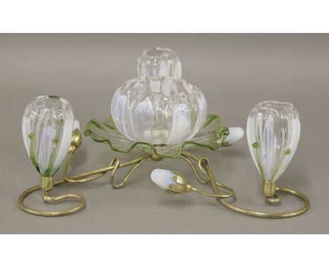 An Art Nouveau epergne,with six coloured glass bowls and three glass 'buds', on an entwined gilt metal base, 11.5cm high