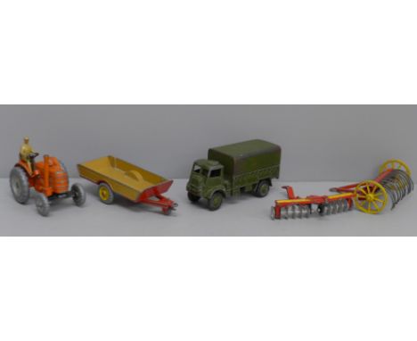 A Dinky Toys Field Marshall tractor, Army Wagon, Halesowen Farm Trailer, a Disc Harrow and one other 