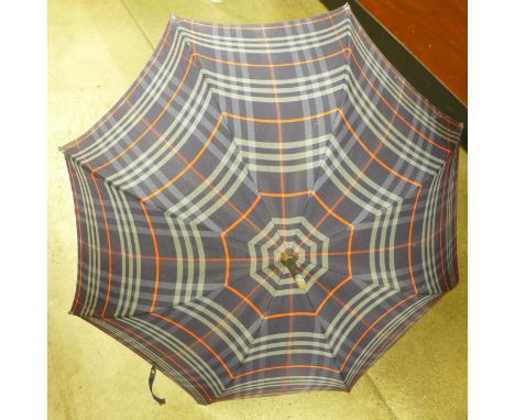 A vintage Burberry umbrella 
