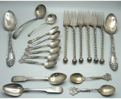 Four silver spoons, 64g, and a collection of plated flatware 