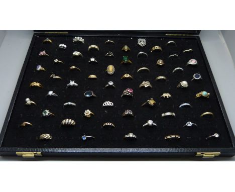A ring tray box with sixty costume rings 