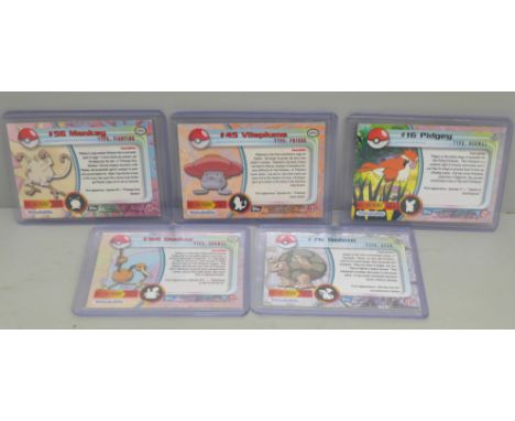 Five vintage Topps holographic Pokemon cards 