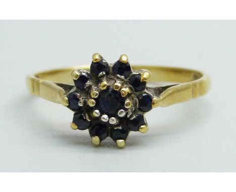 A silver gilt, sapphire cluster ring, P 