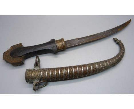 An eastern dagger and scabbard, 41cm with scabbard on 