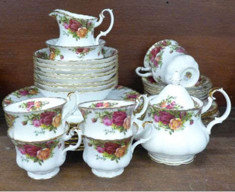 Royal Albert Old Country Roses china, six cups, saucers, side plates, cream, suar, small teapot, eight bowls and eight dinner