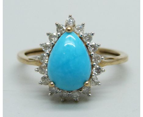 A 9ct gold and teardrop turquoise ring surrounded by seventeen 0.05ct brilliant cut diamonds, 2.3g, P 