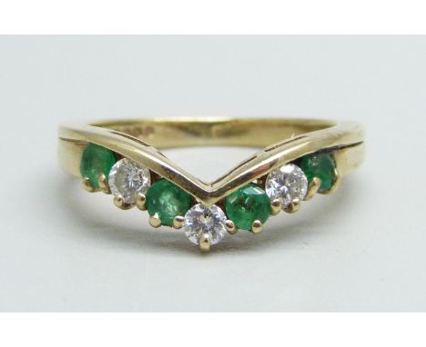 A 9ct gold, emerald and diamond wishbone ring, 2.7g, K 