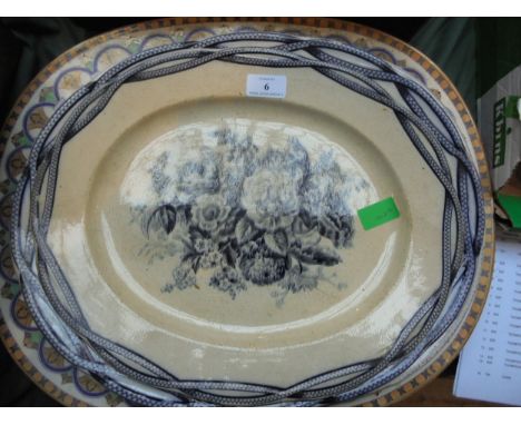 4 large ceramic meat serving plates, 1 being highly decorative, the others blue and white
