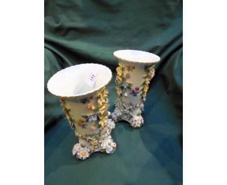Highly decorated ceramic vases, matching pair marked Germany with cross to base
