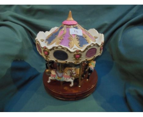 Ceramic battery operated fun fair revolving roundabout