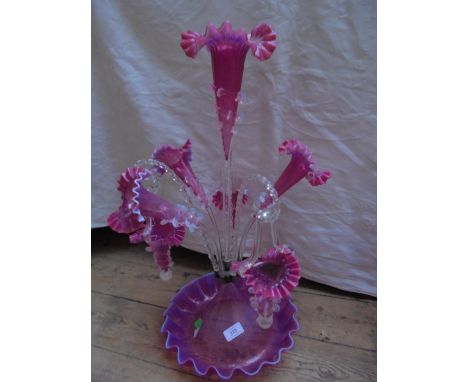 Superb epergne in cranberry glass of large proportions with central base, large raised centre stem, three matching side stems