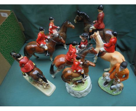 Ceramic model horses with mounted huntsmen in dress wear, together with a fox, 8 pieces in total. 