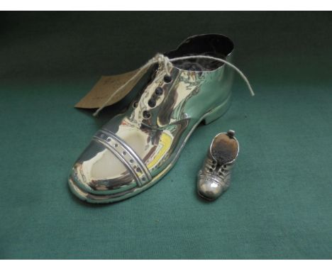 Silver decorative boot, Birmingham 1922, with a smaller item marked 925.