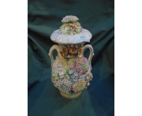 Highly decorated ceramic vase with lid