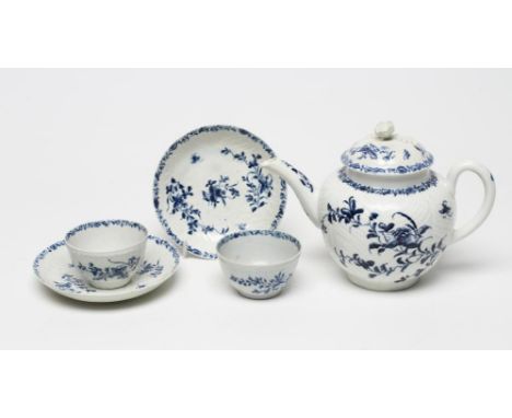 A FIRST PERIOD WORCESTER PORCELAIN TEAPOT AND COVER, c.1760, in "Feather Moulded Floral" pattern, 8" wide, together with two 
