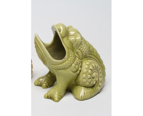 TWO BURMANTOFTS POTTERY SPOON WARMERS, both green glazed and modelled seated, comprising toad, model 151, impressed marks, 5"