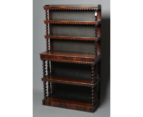 A VICTORIAN ROSEWOOD OPEN BOOKCASE of oblong graduated form with spiral twist and baluster turned shelf supports, the upper s