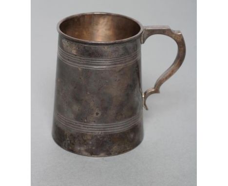 A MUG, maker Harrod's Stores Ltd., Sheffield 1916, of tapering cylindrical form engraved "JVC" within engine turned bands, wi