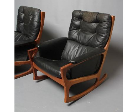 A PAIR OF FORMOSA TEAK AND LEATHERETTE FRAMED ROCKING ARMCHAIRS, 1970's, the shaped square section uprights enclosing a ladde