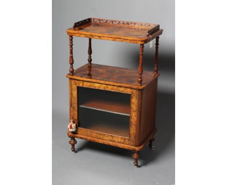 A VICTORIAN BURR WALNUT MUSIC CABINET/WHATNOT, of two tier rounded oblong form with stringing, the upper shelf on turned spin